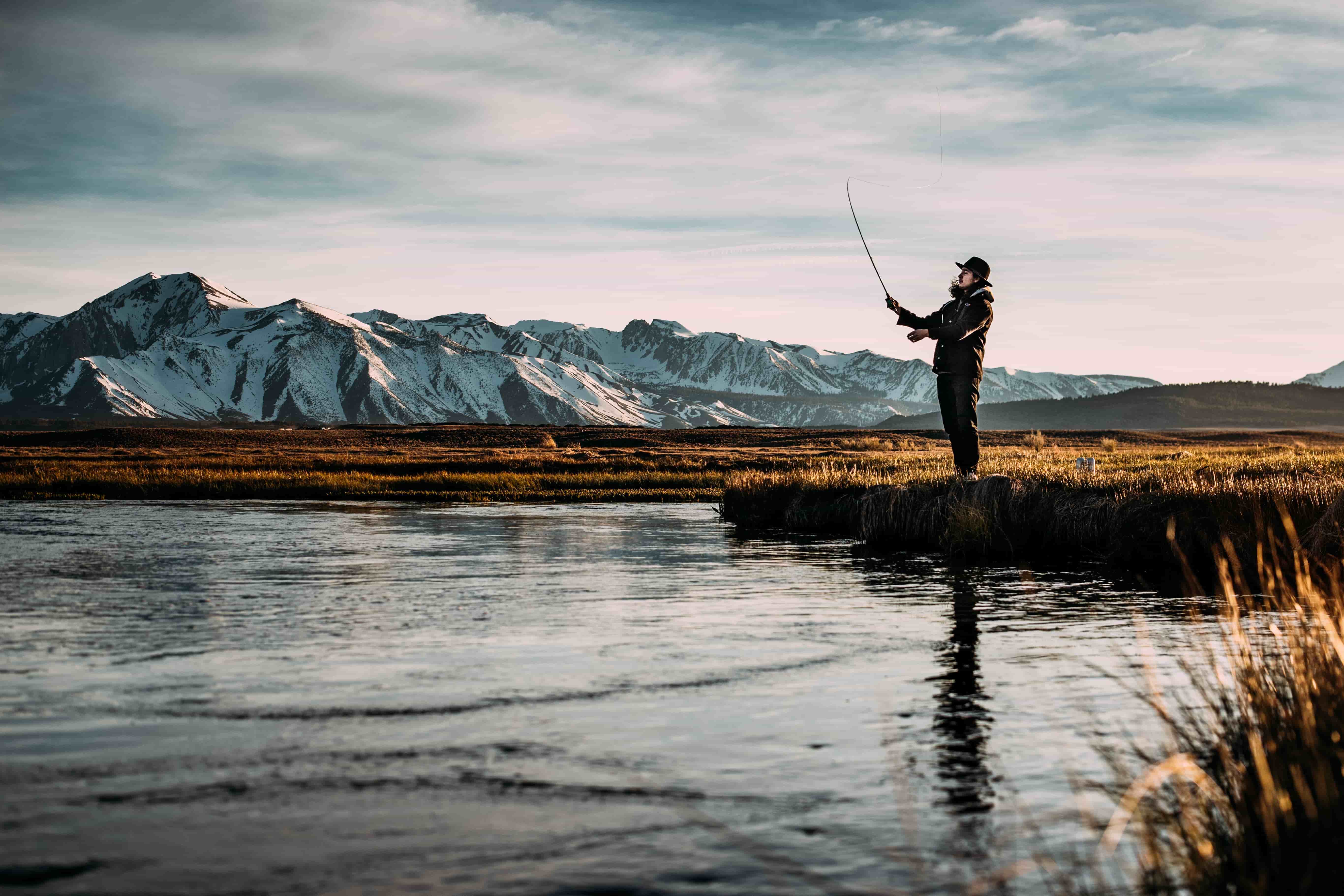 riffle labs hero image - fly angler on scenic river